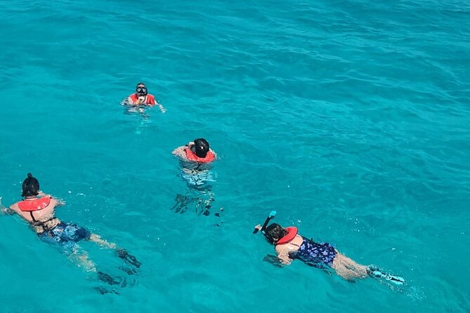 Guided All Inclusive Beach Day Excursion in Bahamas - Group size and the boat ride feel: 25 people vs 380 capacity