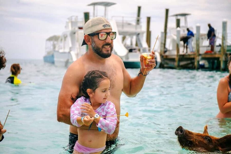 Nassau: Rose Island Swimming Pigs and Beach Day Group Tour - Food and drinks at the beach bar: budget it like a snack run