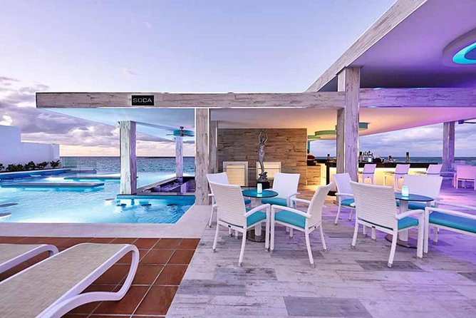 Round trip Airport (LPIA) to Atlantis, Comfort Suites, Warrick, Harbourside, RIU - Optional store stop upgrade: groceries and liquor on day one