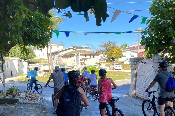 Shared Island Bike Tour in Bailey Town - Bailey Town moments: bonefish club, conch stand, and real local texture