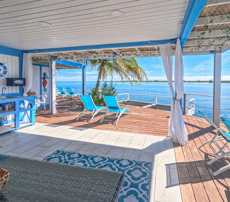 SunCay Private Oceanview Villa up to 6 with Lunch and Ferry - Island time on Sun Cay: sunbathing, lunch in your villa, and unlimited drinks