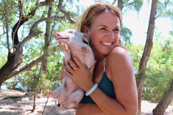 Swimming Pigs & ATV Tour - Stop 2: Adelaide Village, a cultural village followed by a full beach menu